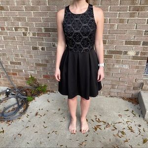 Black lace knee length dress with nude underlay